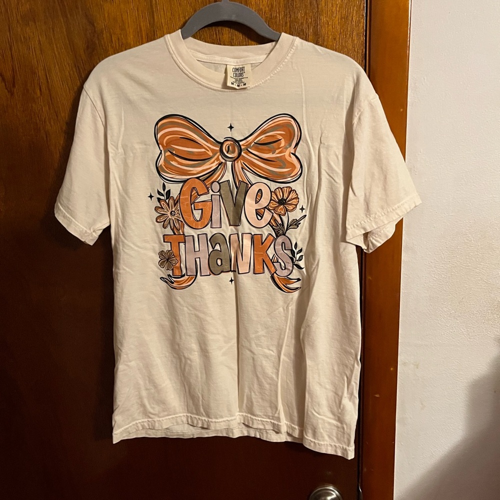 Comfort Colors Beige Tee with Orange Bow Design